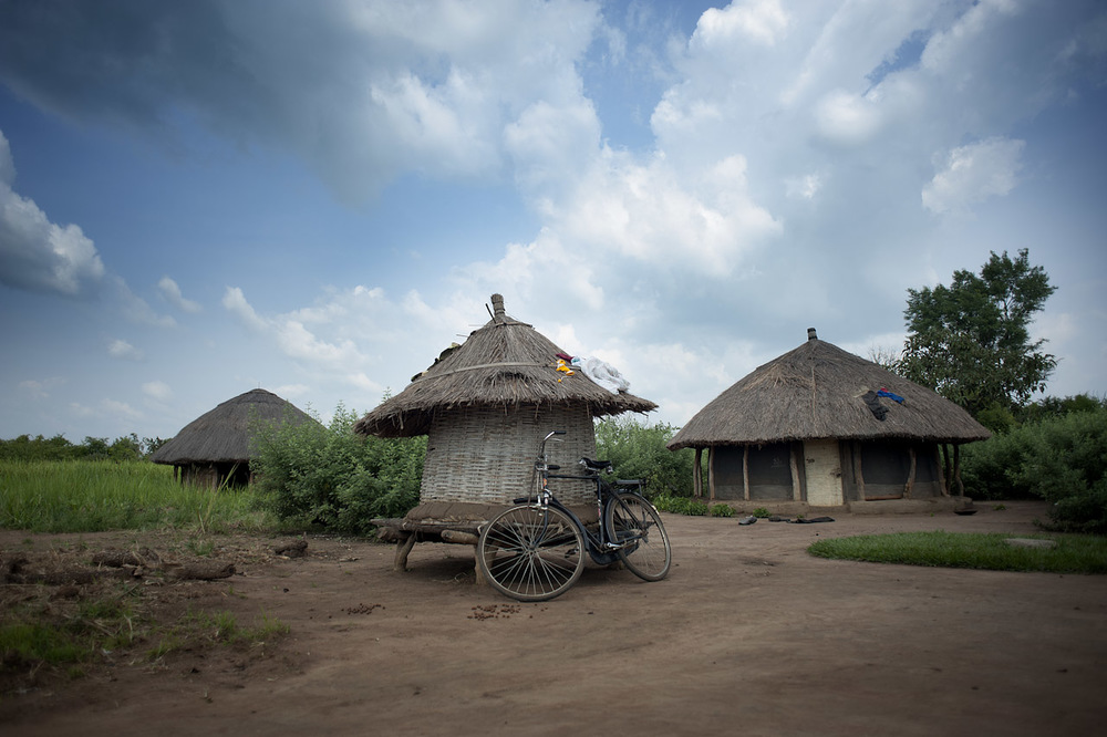 Bicycle on hut with clouds.jpg
